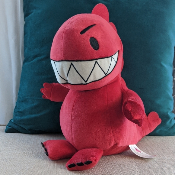 red dinosaur plush